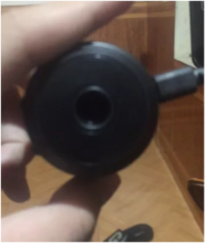 person holds PixieLens Pro